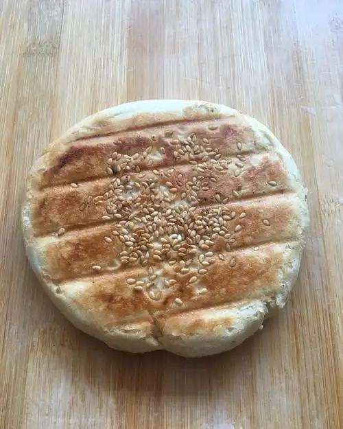 手机用户5699_c9vt做的电饼铛烧饼