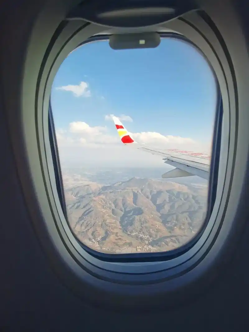 在飞机上用手机拍的照片不怎样没关系咱可以修图