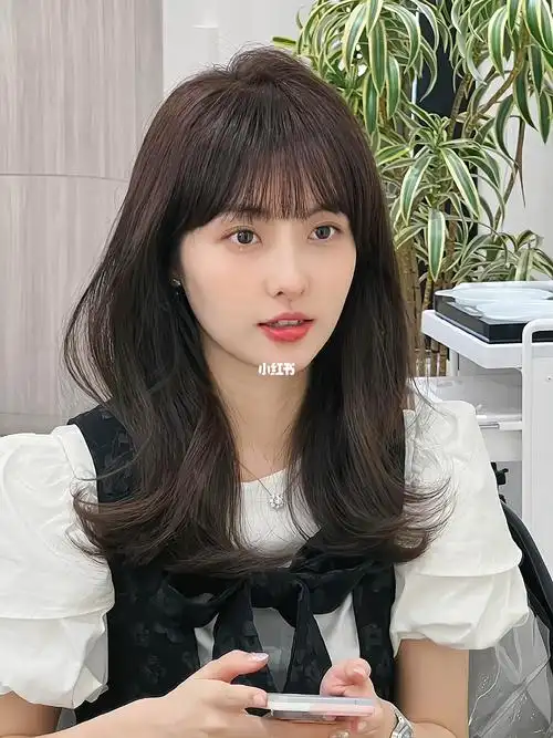 中长发气垫烫蓬松简约的气垫烫高级显脸小