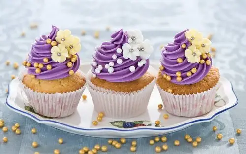 purple cupcake with candle