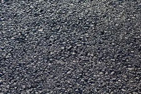 新的沥青路面的特写水平视图照片