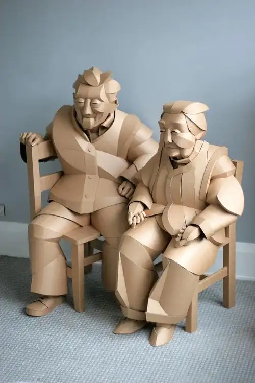 life-size cardboard sculptures of chinese villagers