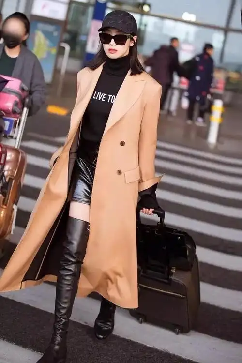 虽然女明星们穿漆皮的过膝靴能显得攻气十足,但它对腿型的要求很高