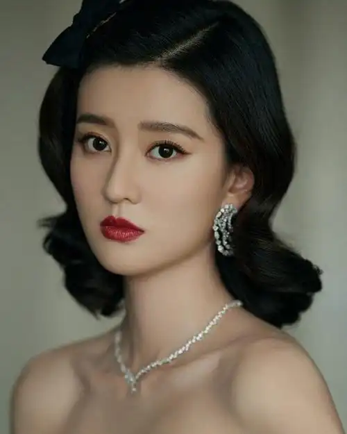 乔欣墨绿流光裙复古写真图片