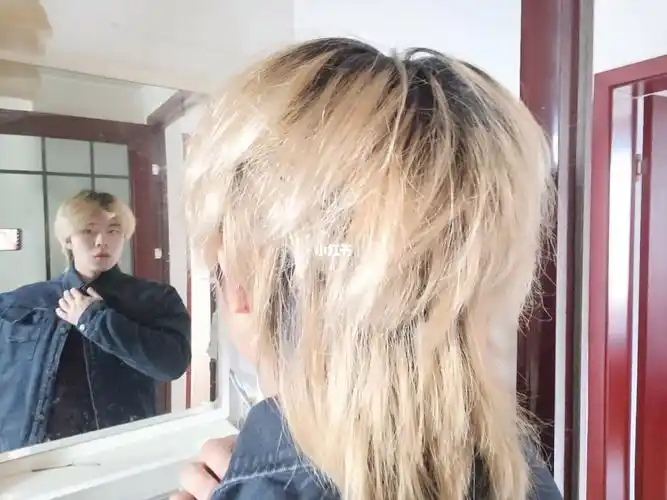 留出来了,不太好看,应该是我人长丑了.后头又去烫了一下.