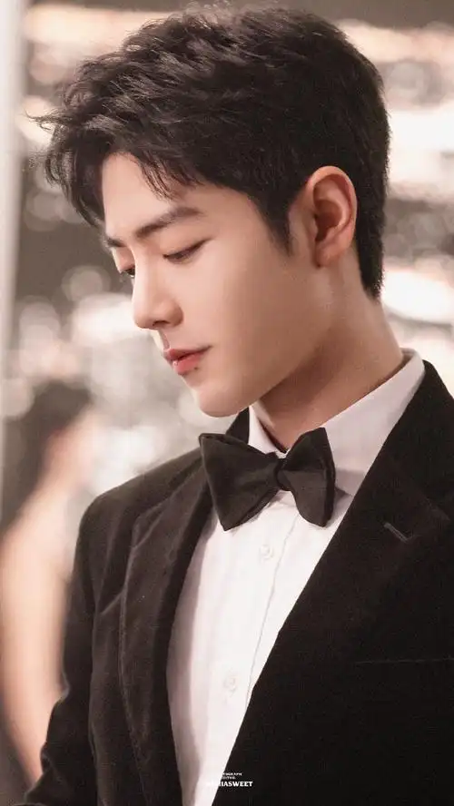 肖战##肖战黑色西装领结造型库存照