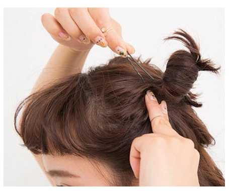 两个丸子头怎么扎图解