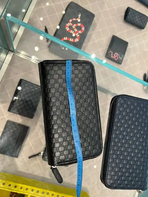 古驰男款手拿包价格美丽