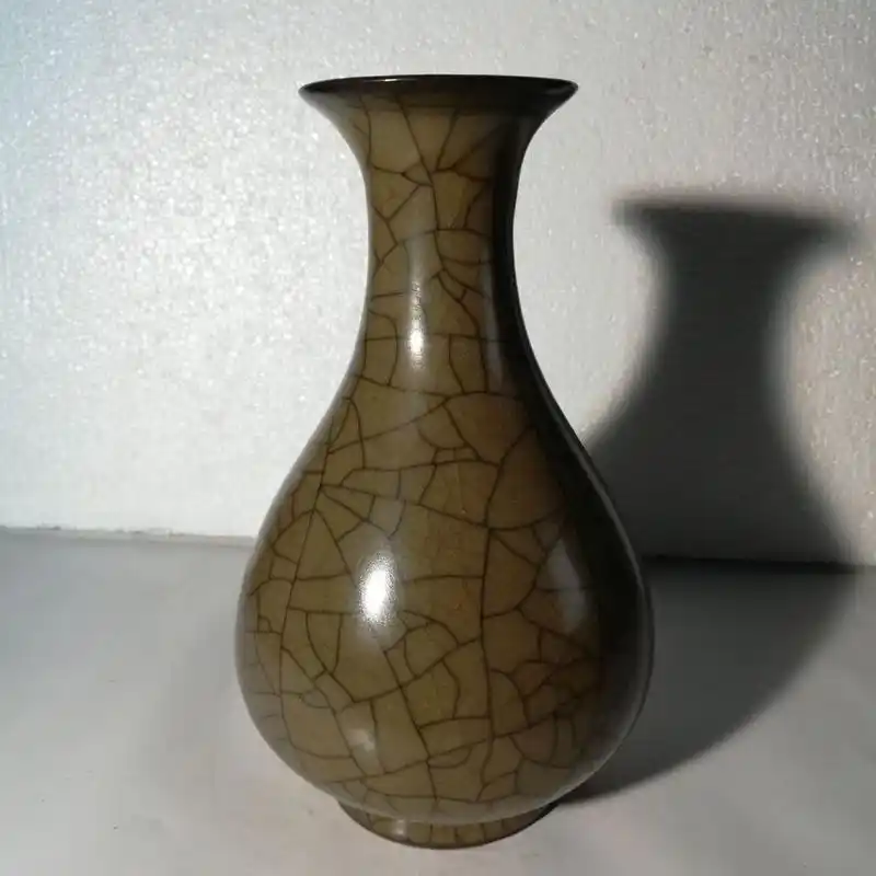 北宋黄米釉金丝铁线冰裂纹开片玉壶春哥窑赏瓶