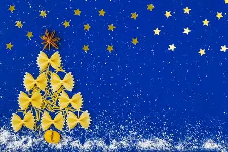 背景是蓝色的雪地,上面有星星