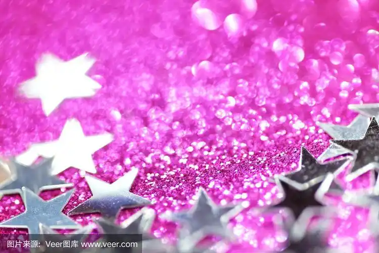 银色的星星在粉红色闪闪发光的背景上