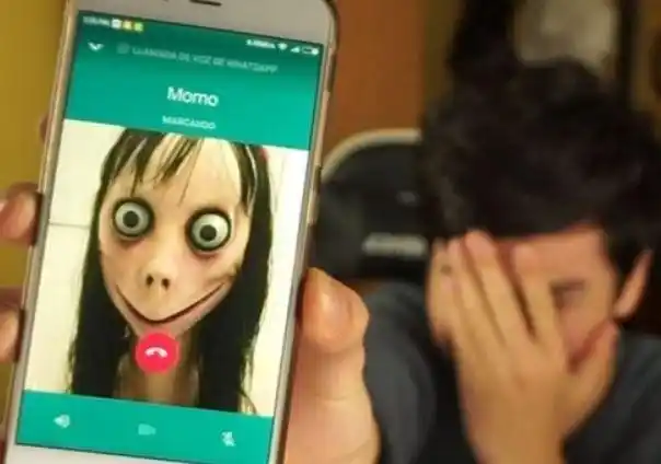 ▼ 网路流传一名凸眼裂嘴,皮肤苍白的恐怖女孩「momo」,透过whats