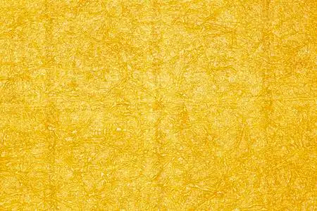 金色纸张纹理背景/抽象黄色复古床单照片