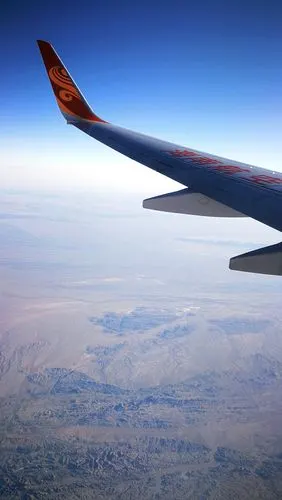 飞行模式10月初去新疆旅游在飞机上随拍飞行途中一路飞越平原大地高原