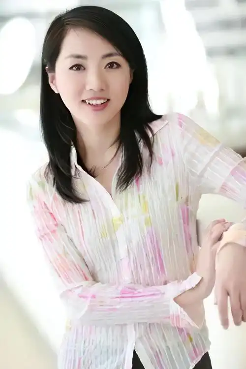 回顾杨丹工作27年为事业选择丁克15年40岁产女全家乐开怀