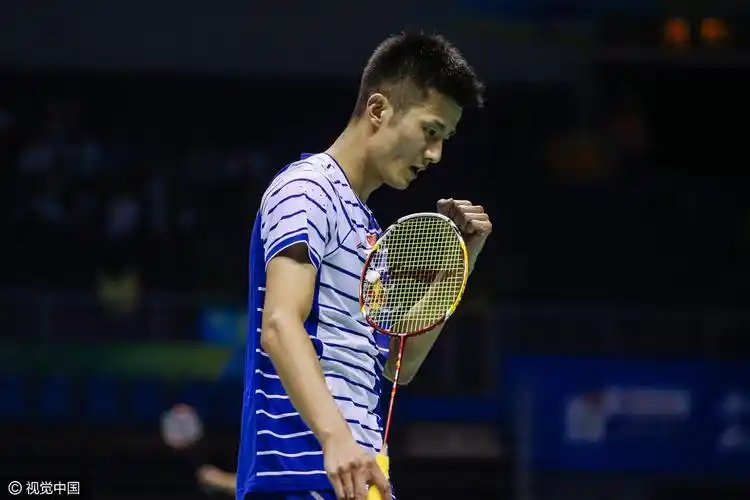 组图-林丹帅气文身抢镜 谌龙逆转日本名将