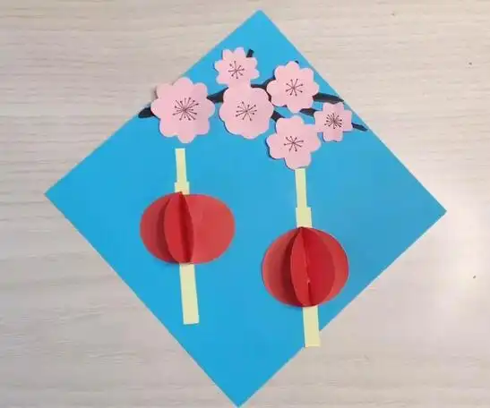 春意盎然的纸剪贴画 樱花树下的灯笼