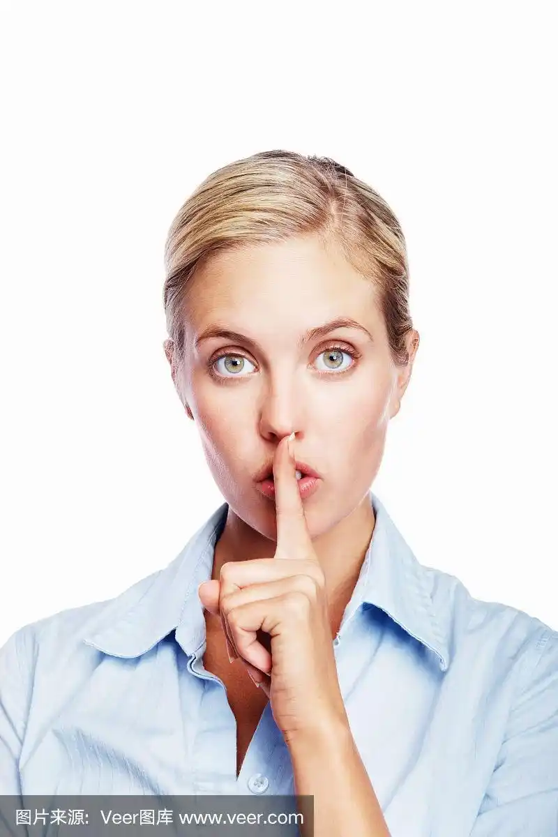 女商人用白色手势示意安静