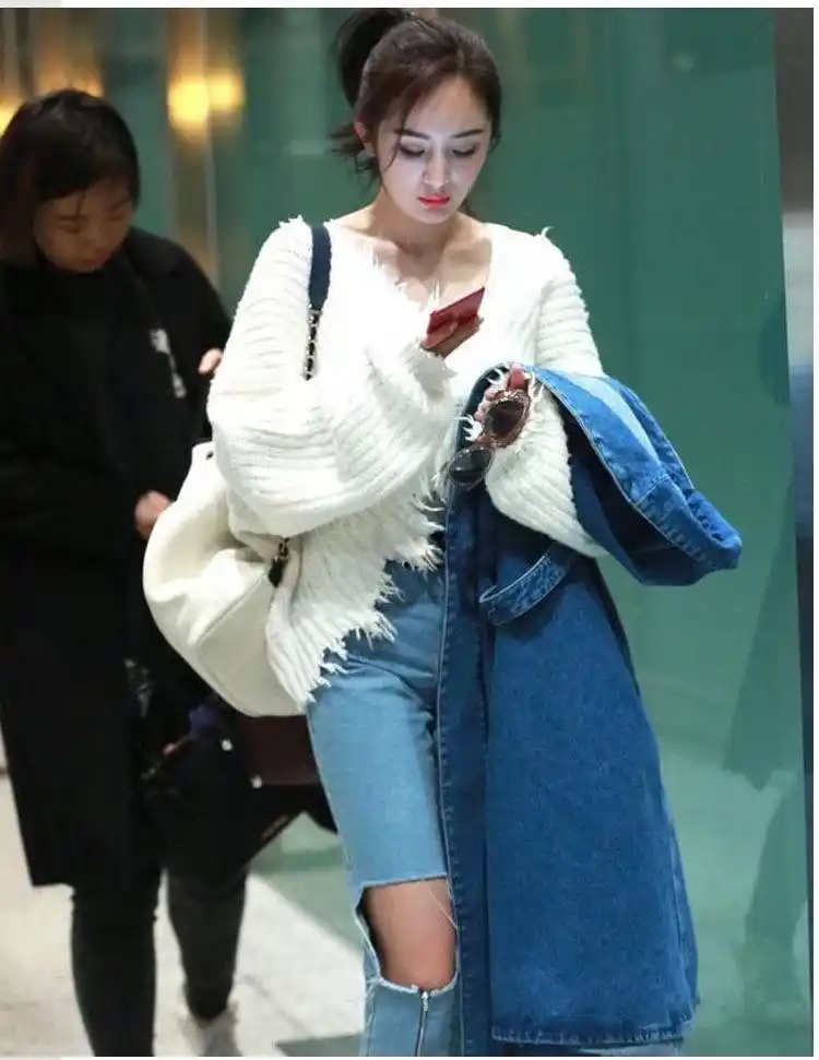 杨幂机场照片冬天?杨幂机场照片!