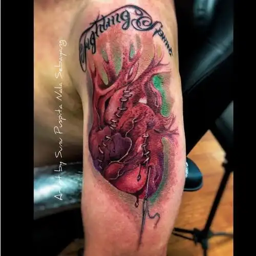 心脏纹身图案另类且有个性的10张心脏纹身图案