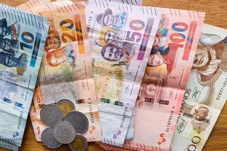 玻利维亚的钱,玻利维亚人.各种面值的钞票照片