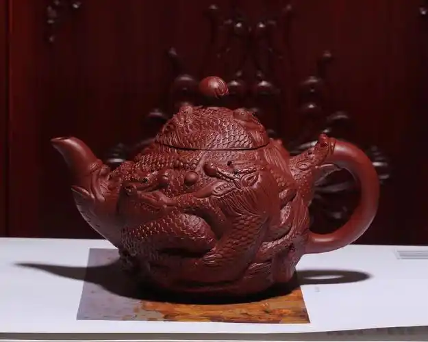 宜兴紫砂壶九龙壶