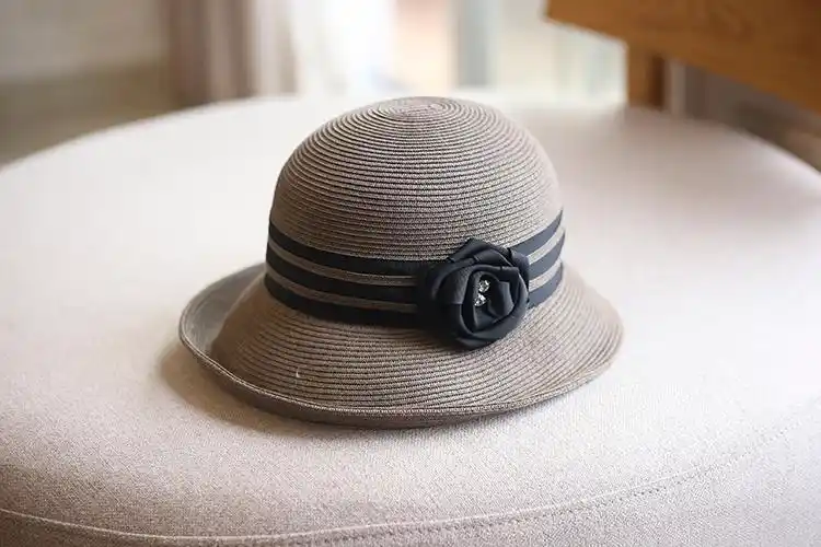 法国轻奢帽子女春夏草帽时尚卷边防晒出游盆帽花朵渔夫帽宽檐休闲圆顶