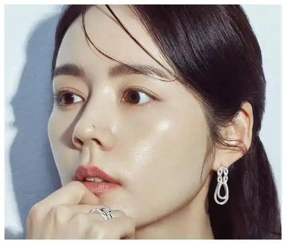 韩佳人延政勋合拍大片结婚19年首拍双人海报丈夫看妻子好温柔