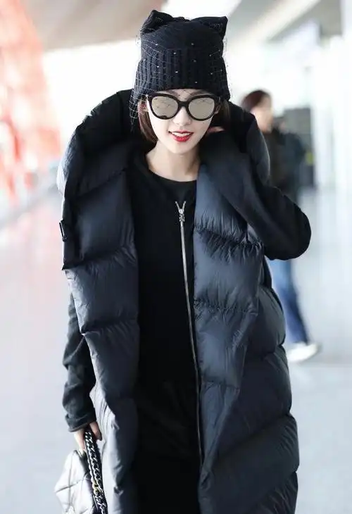 张嘉倪机场状态非常好针织网纱帽酷酷的明媚的脸蛋打破谣言