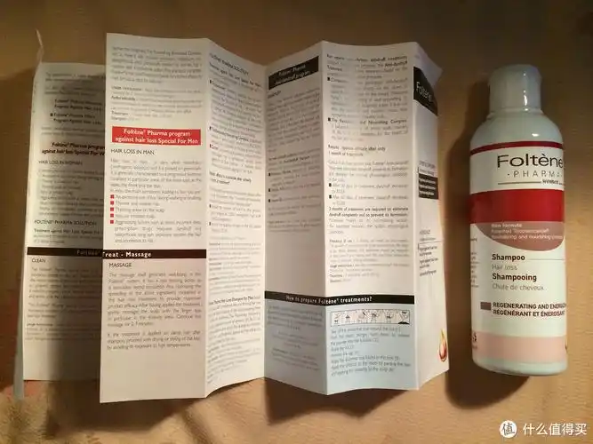 英文说明说明书介绍了头发的生长周期和男女脱发情况的不同.