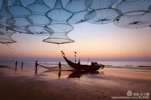 粤西行行摄摄(三)吴阳金海岸日岀,渔民抬船,牵大网,岀海捕鱼