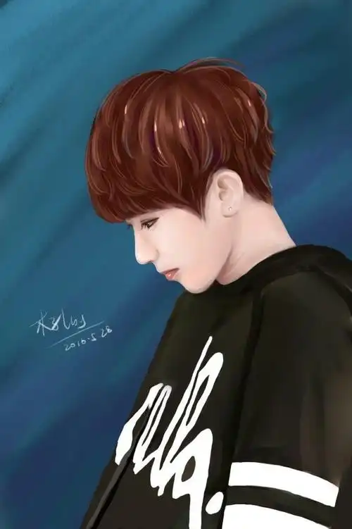 侧脸的蔡徐坤,微微低着头,感觉很忧郁.