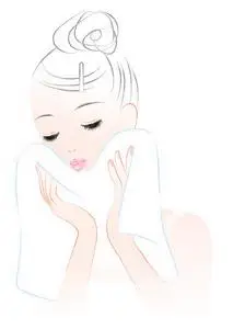 去毛一个女人用毛巾擦脸.护肤护理照片