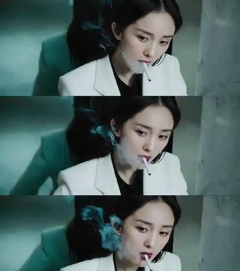 杨幂新作造型曝光首次饰演反派角色的她穿白西装叼烟模样女王气质十足