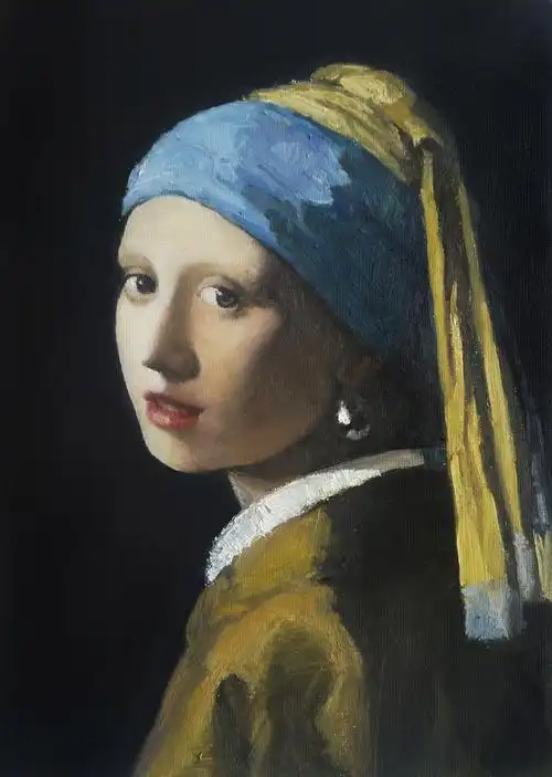 带珍珠耳环的少女