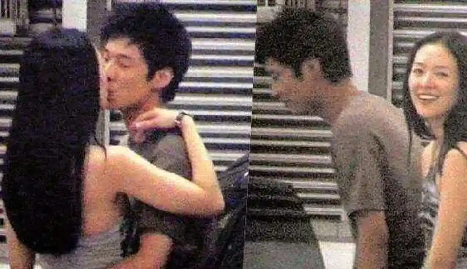 2004年,章子怡和霍启山在车库被狗仔拍到激情热吻的视频,然后.