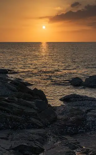 静怡幽深大海,于是我拿起了相机,用慢门拍摄下这美丽的风景