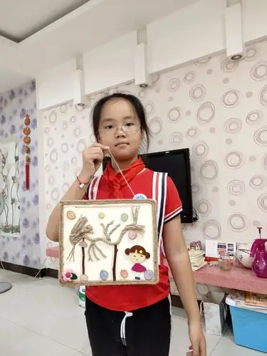 巧手生花 变废为宝 创意无限—记崇相西小学四年级手工制作大比拼