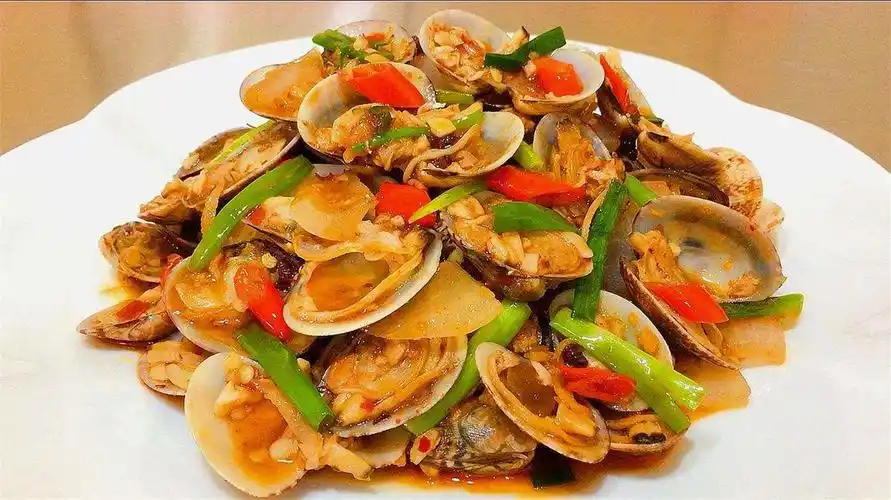 爆炒花甲(爆炒花甲需要炒几分钟)