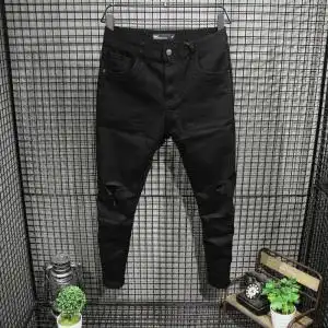 男款黑色裤子破洞图片