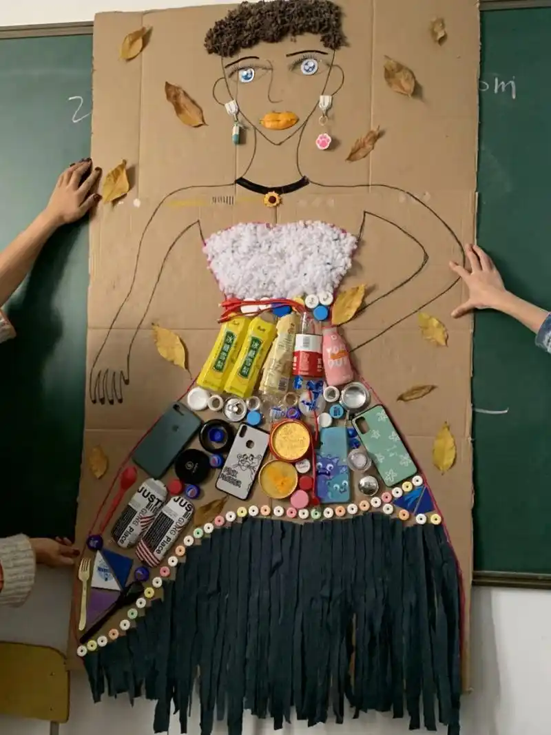 手工作品 废物利用 幼儿自己动手画出一个女孩的轮廓,然后用一些废旧