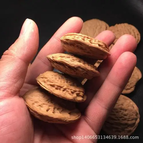 一手货源批发 文玩核桃 扁核桃 背云夹板核桃 鸡心树叶核桃吊坠