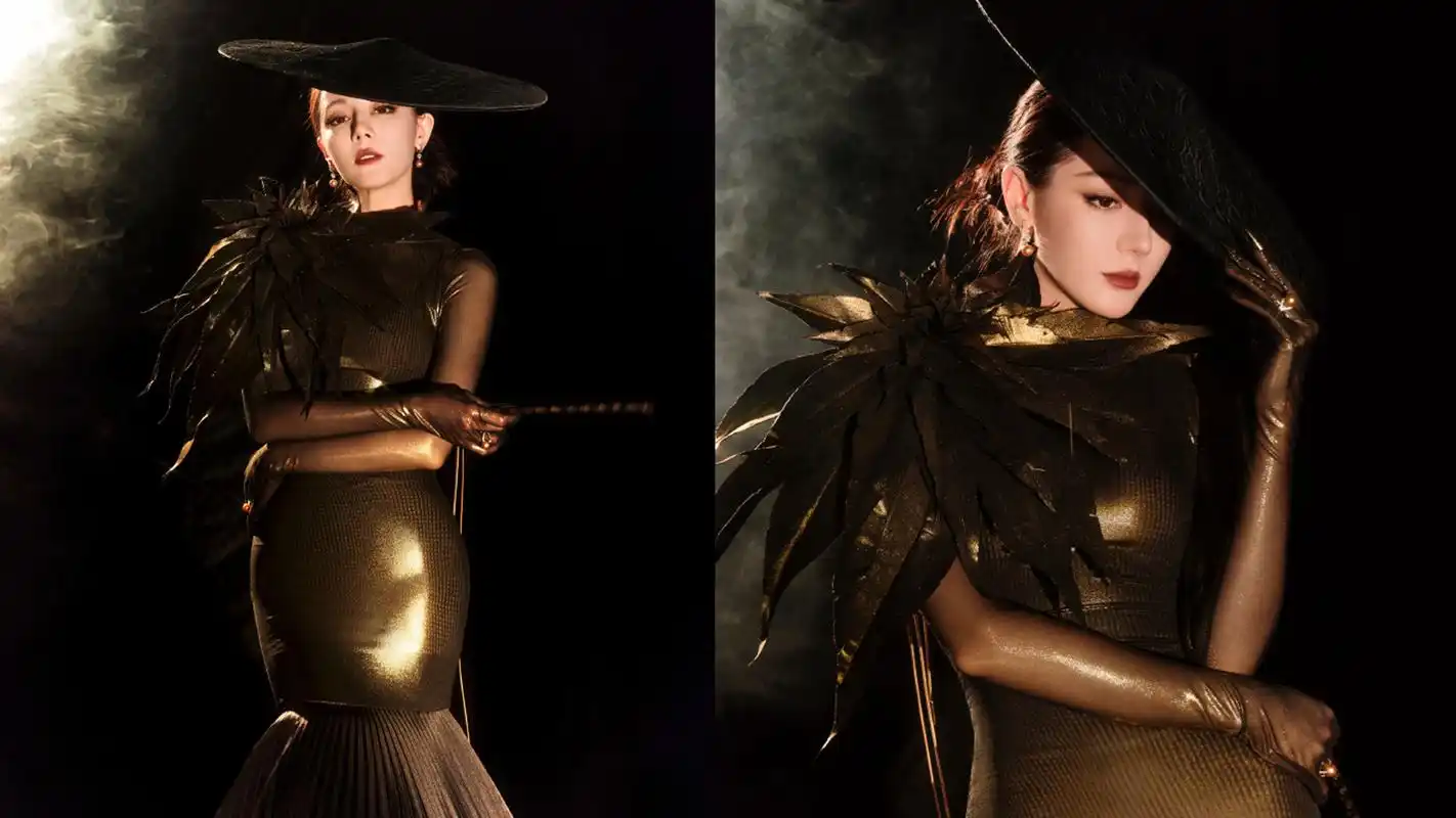 迪丽热巴时隔605天重返大型红毯活动:黑色礼帽金色礼服手持烟斗,暗夜