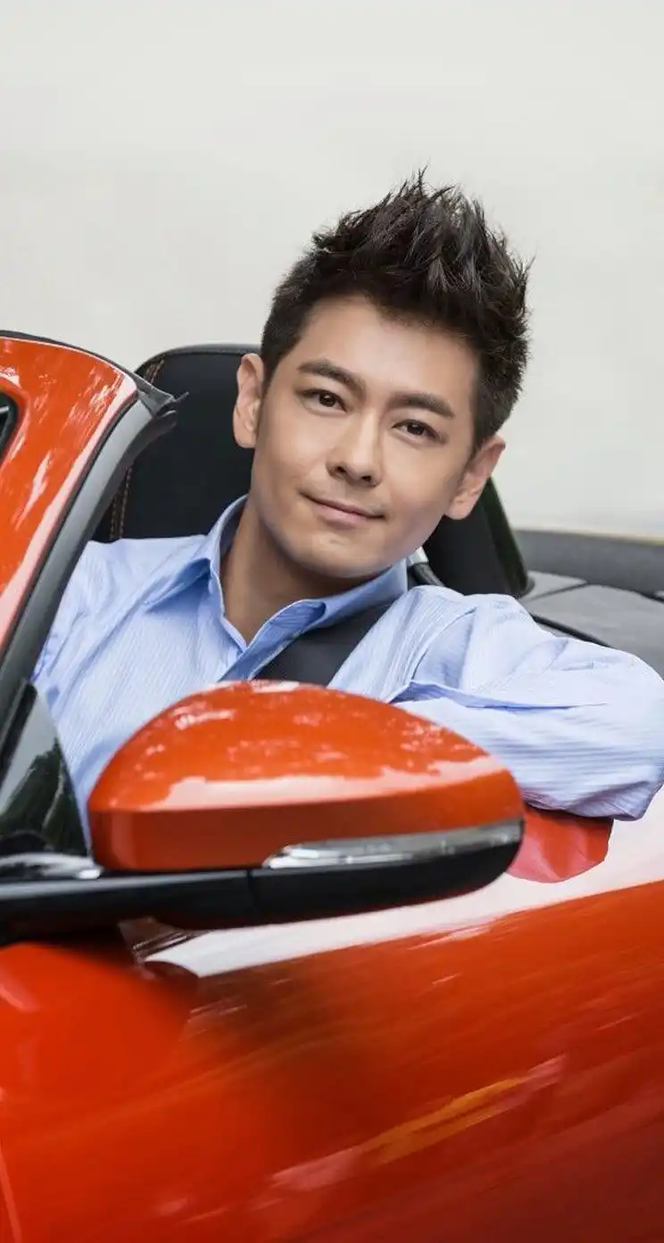 林志颖帅气老爸手机壁纸中,帅气年轻的老爸林志颖和他可爱的儿子参加