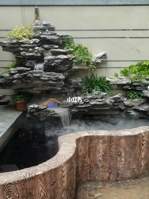 鱼池假山,庭院景观这样的风格也不错哟#鱼池假山  #庭院景观设计