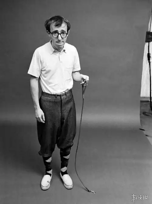 伍迪艾伦牵着一只蚂蚁,1964年.