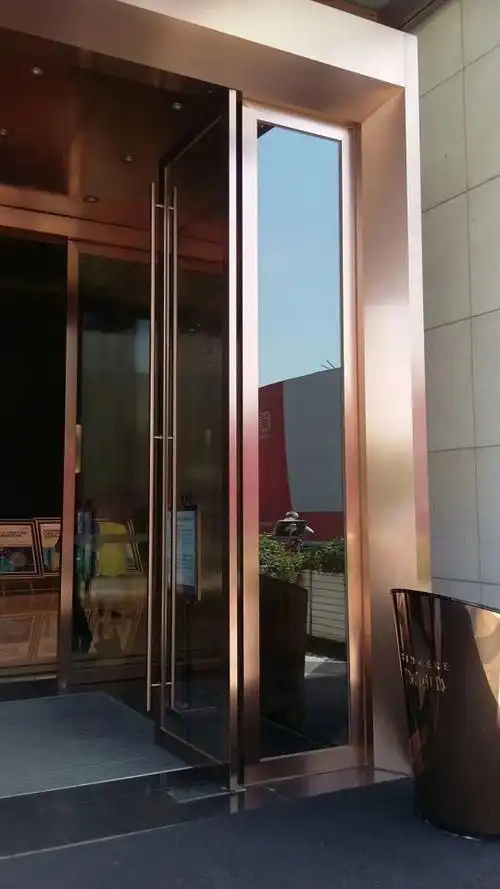 不锈钢玻璃门玫瑰金地簧门门面有框钢化玻璃门门店玻璃门