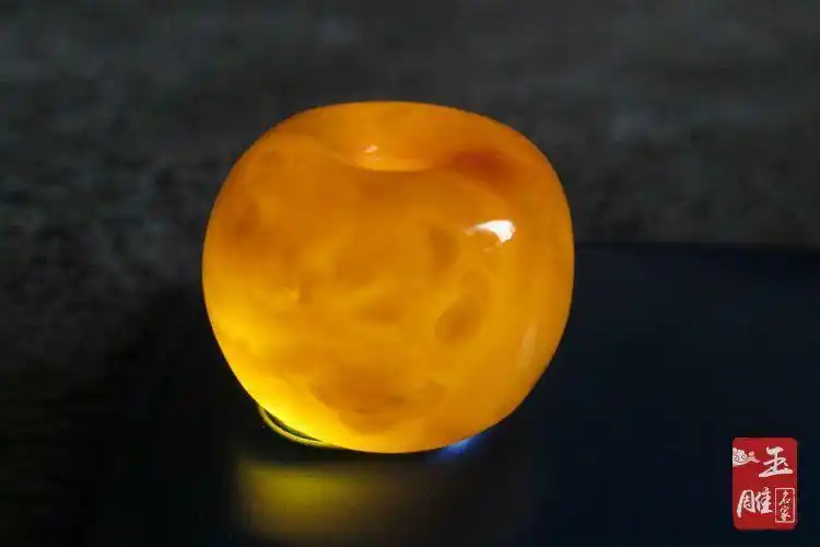 天然蜜蜡云纹透光图片,如何用云纹鉴别蜜蜡真假?