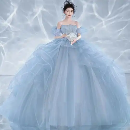 影楼彩纱主题拍摄情侣写真服装室内光影婚纱照摄影冰蓝色轻纱礼服