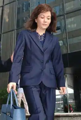 上海首富周正毅妻子毛玉萍图终止聆讯失败